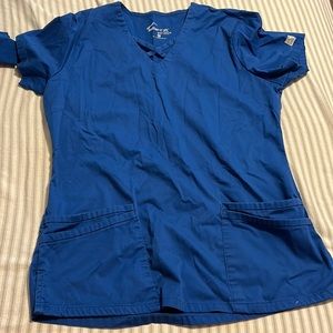 Woman’s small royal blue butter soft scrub top